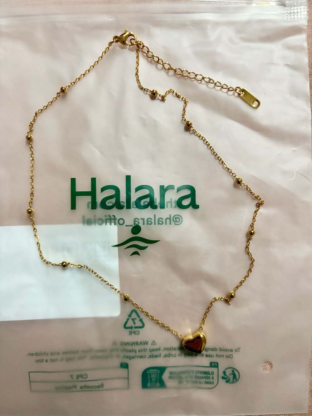 Halara Gold Tone Stainless Steel Heart Pendant Station Necklace